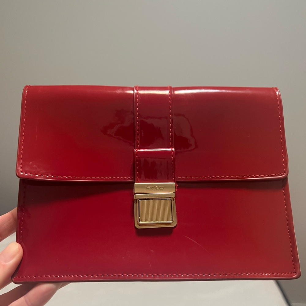 Miu Miu red patent clutch